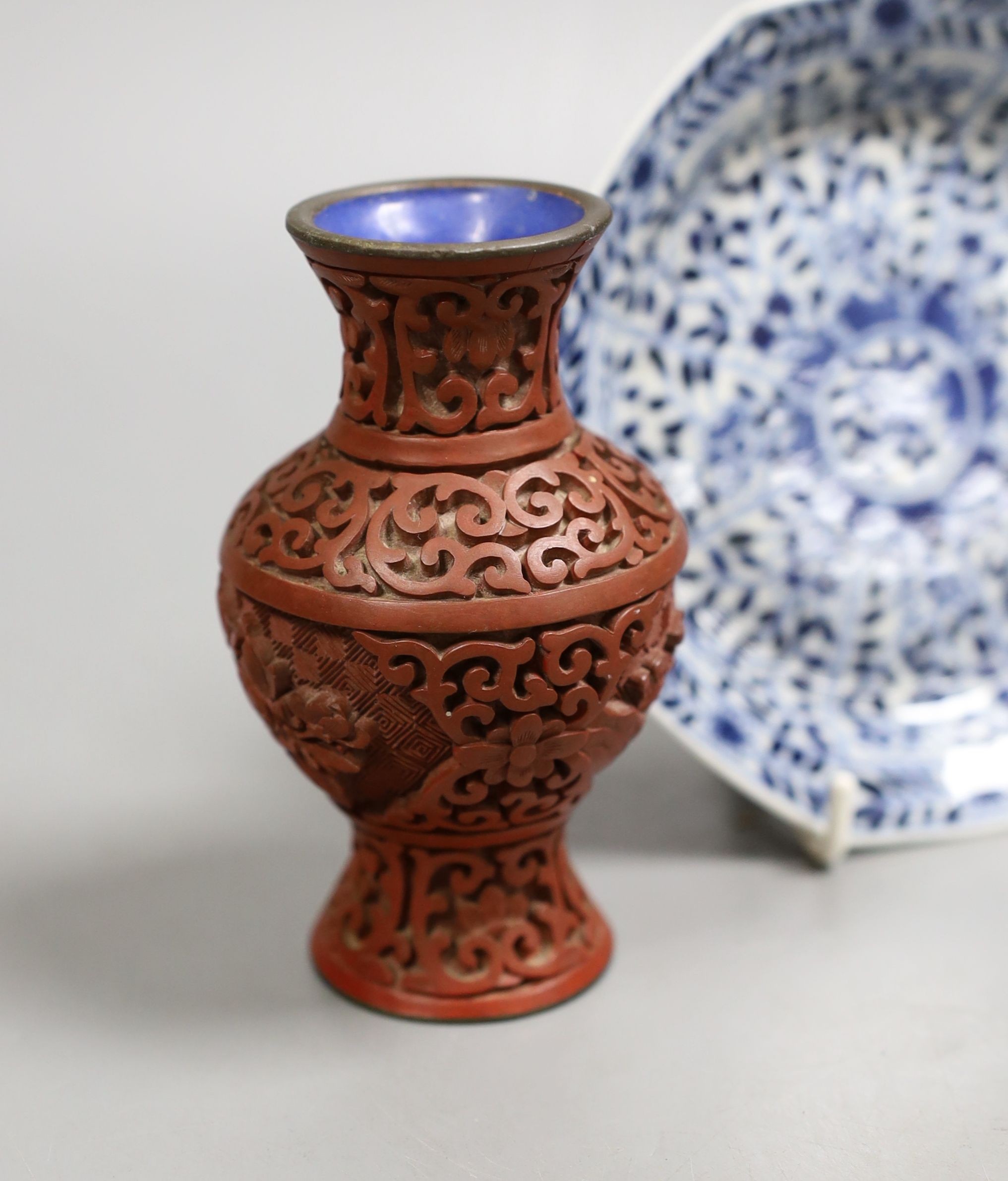 A Chinese Kangxi style octagonal dish, a Chinese cinnabar lacquer vase and a blue and white box, Dish 12.5 cms.